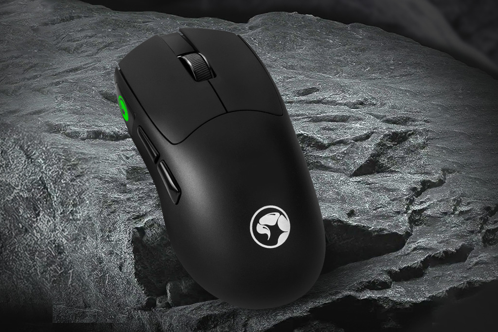 Black ergonomic gaming mouse with side buttons and scroll wheel, positioned on textured gray stone background, highlighting its sleek design and functionality for optimal gaming performance.